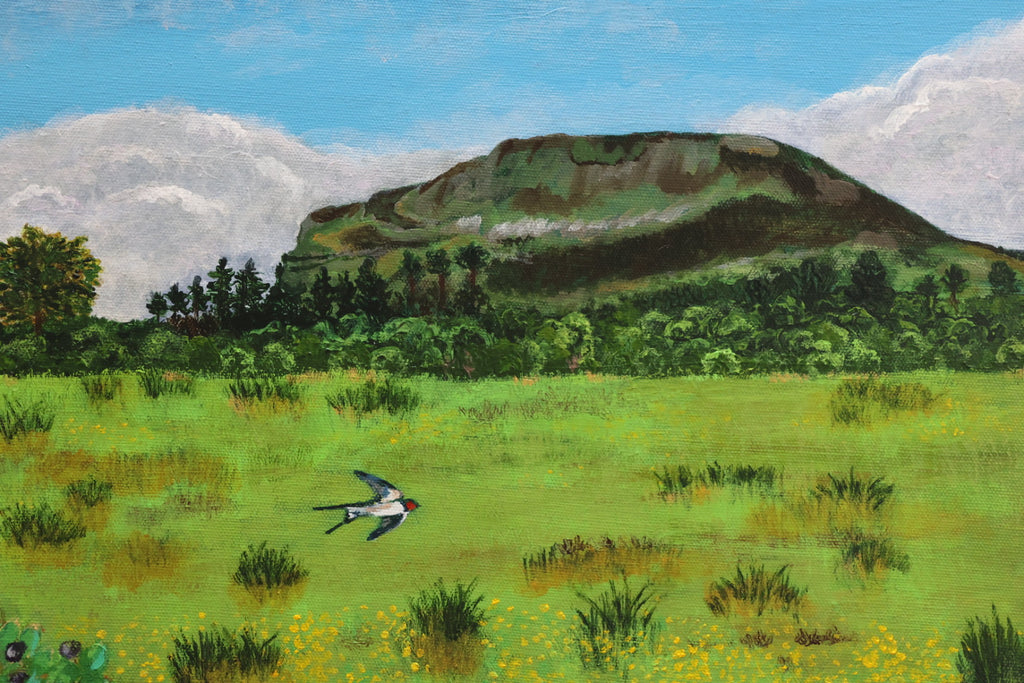 Painting of a landscape with a hill, grassy field, and bird.